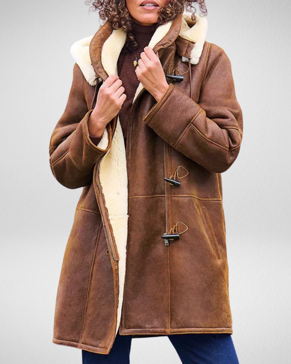 Damski płaszcz zimowy z kapturem i sztuczną owczą skórą, luźny krój